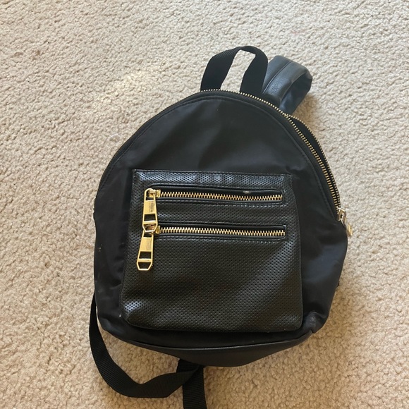 Madden Girl Handbags - Madden Girl Black Gold Backpack Sleek Design